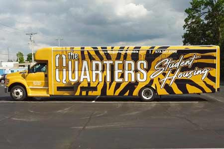 Quarters at Columbia Shuttle Bus Wrap